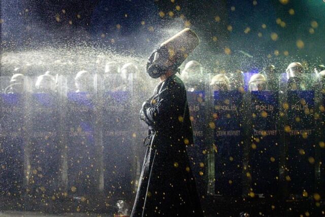 Gas-masked Whirling Dervish gets blasted with pepper spray by Turkish riot cops in and spins it off like a Sufi superhero. It’s as stunning as it is surreal. 📷: Chris McGrath/Getty Images